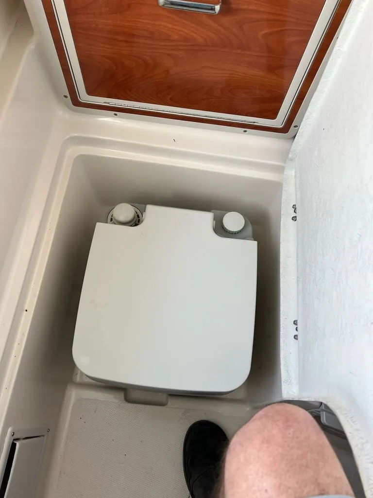 Slide: The Image of Portable toilet in a 2008 Polar 2300 WA boat. - 17