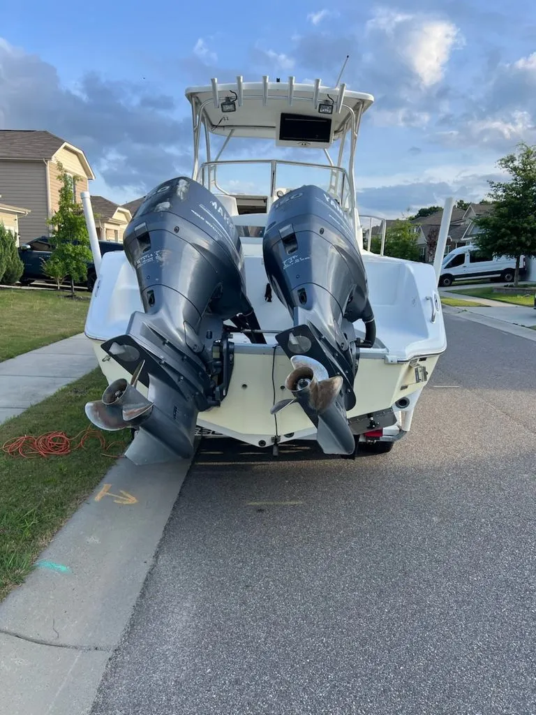 Slide: The Image of Rear view of a 2008 Polar 2300 WA boat with twin outboard motors. - 3
