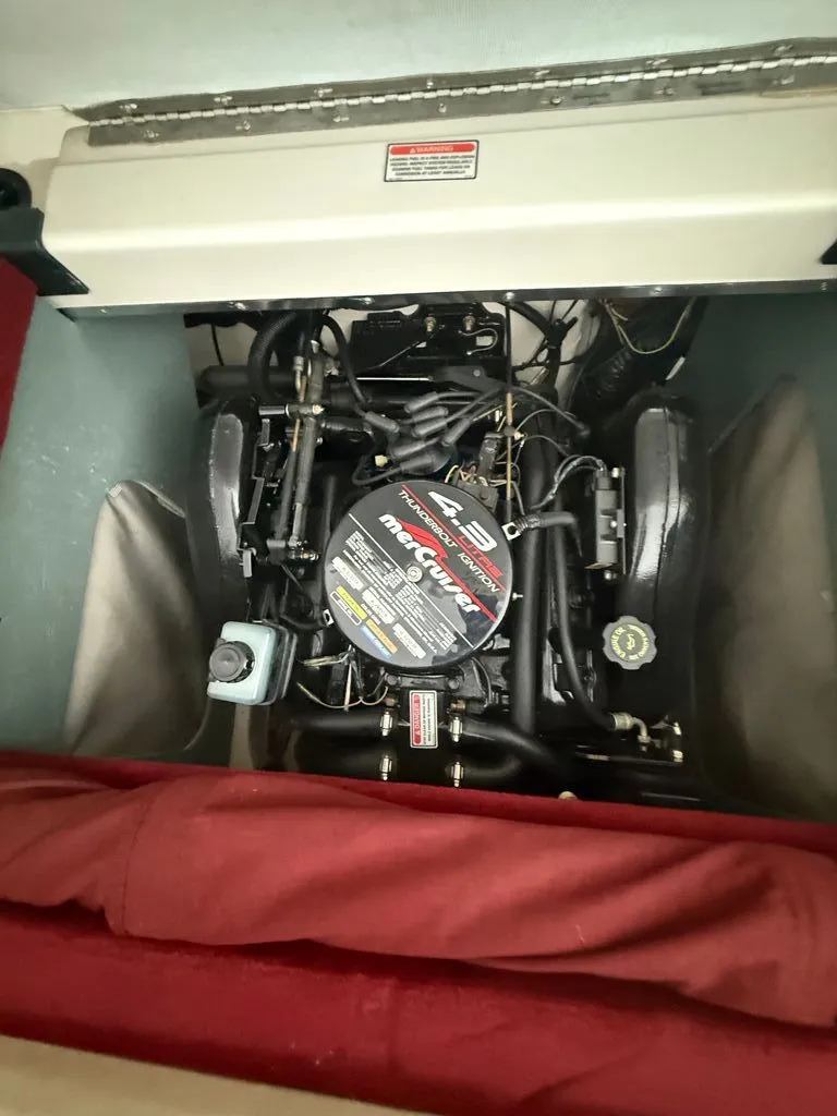 Slide: The Image of Engine compartment of a 2009 Sea Ray 185 Sport boat. - 2