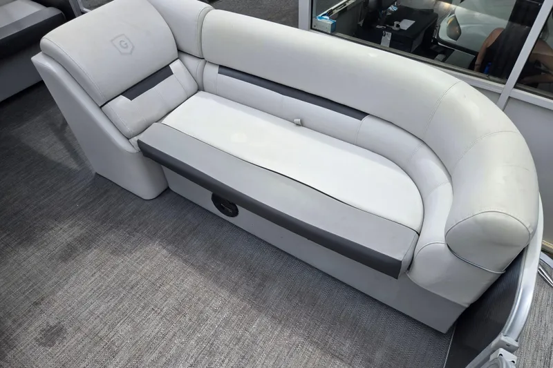 Slide: The Image of 2023 Godfrey Sweetwater 2286 C boat interior with white cushioned seating. - 10
