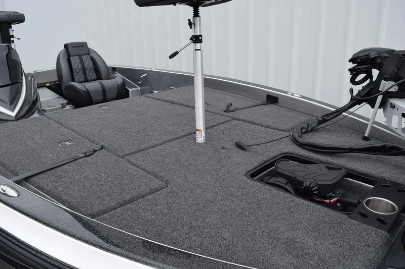 Slide: The Image of 2027 Caymas 201 Pro boat deck with seating and fishing equipment. - 11