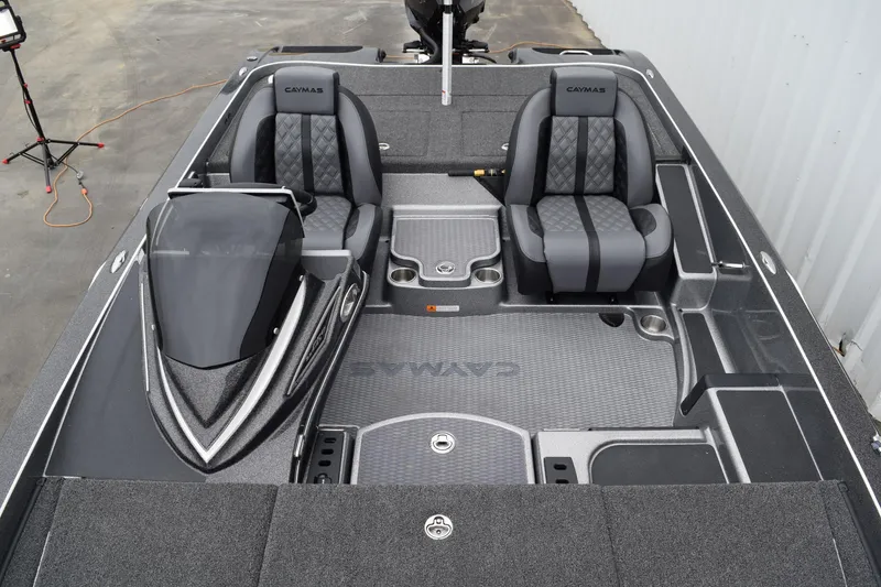 Slide: The Image of 2027 Caymas 201 Pro boat interior with dual seats and sleek design. - 15