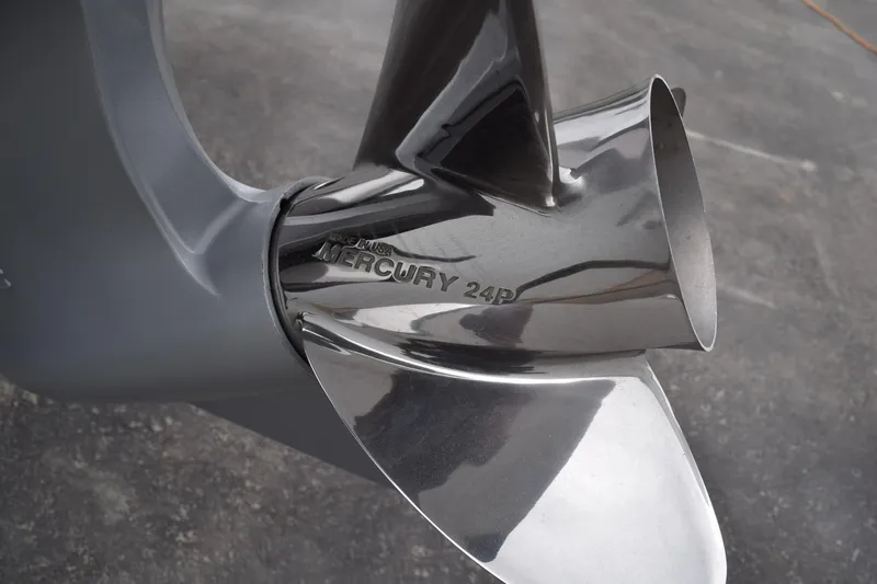 Slide: The Image of Close-up of a Mercury 24P propeller on a 2027 Caymas 201 Pro boat. - 28