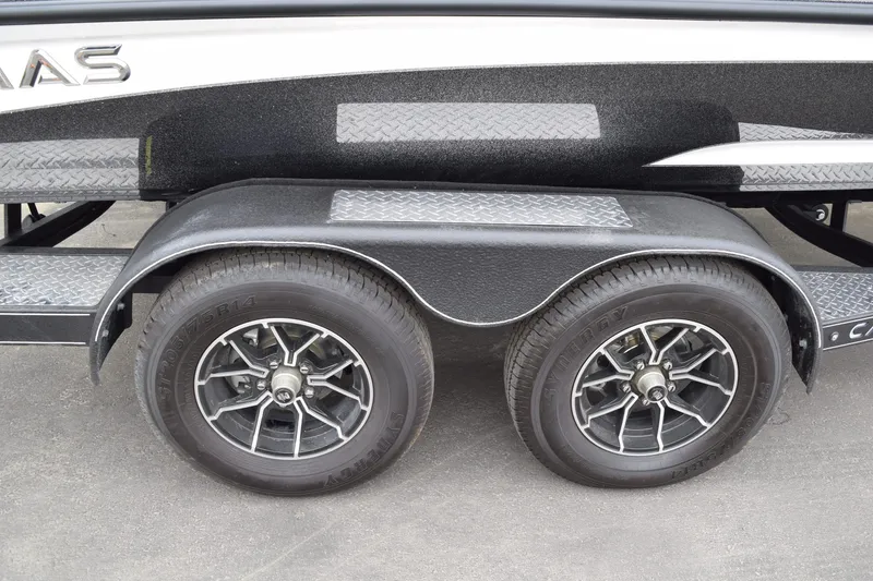 Slide: The Image of 2027 Caymas 201 Pro trailer with dual wheels and textured fenders. - 33
