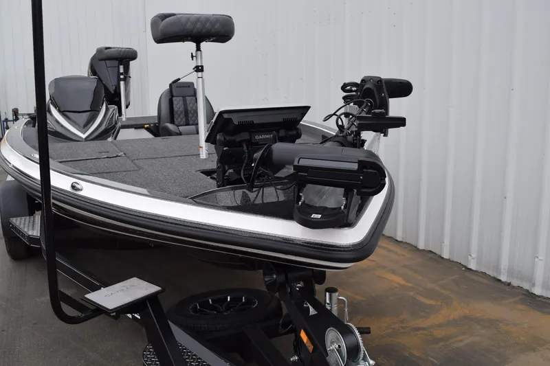 Slide: The Image of 2027 Caymas 201 Pro boat with advanced navigation equipment on trailer. - 7