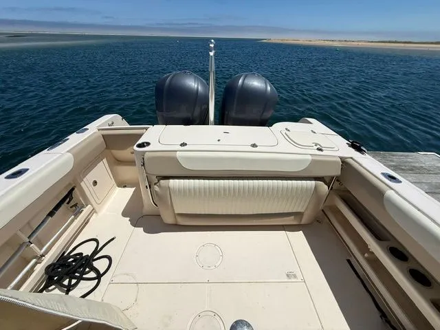 Slide: The Image of 2013 Grady-White Freedom 285 boat on open water. - 12