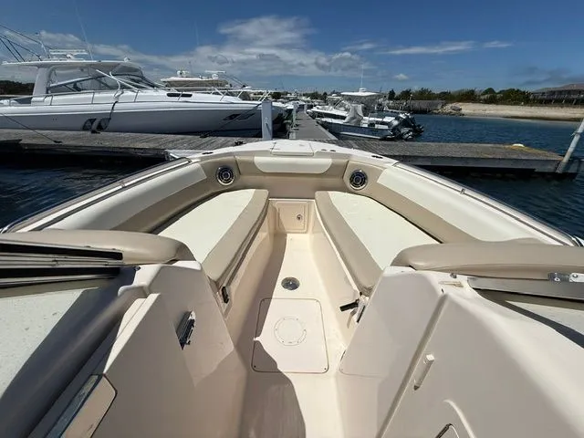 Slide: The Image of 2013 Grady-White Freedom 285 boat at dock, sunny day. - 16