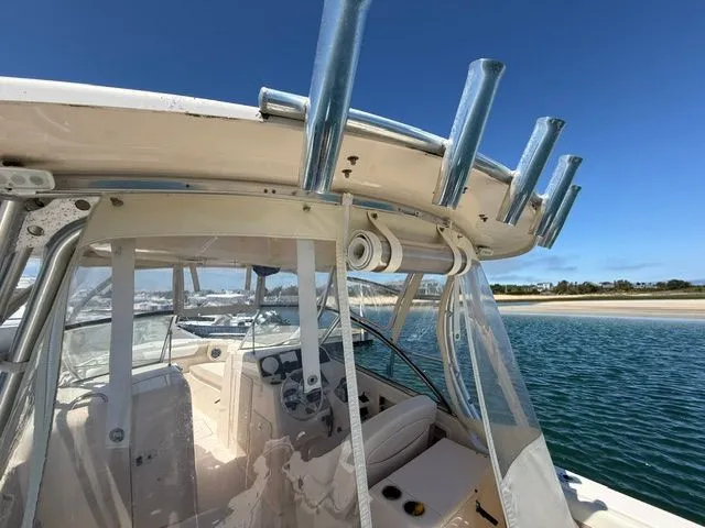 Slide: The Image of 2013 Grady-White Freedom 285 boat on calm waters. - 18