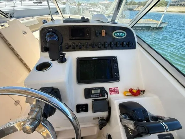 Slide: The Image of Interior view of 2013 Grady-White Freedom 285 boat cockpit. - 7