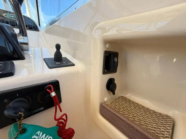 Slide: The Image of Interior view of a 2013 Grady-White Freedom 285 boat. - 9
