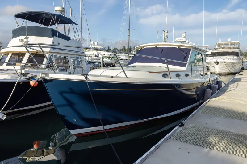 Slide: The Image of 2017 Back Cove 37 yacht docked at marina. - 2