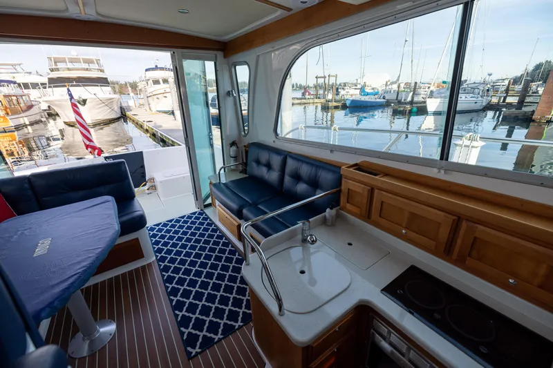 Slide: The Image of Interior of a 2017 Back Cove 37 yacht with harbor view. - 26