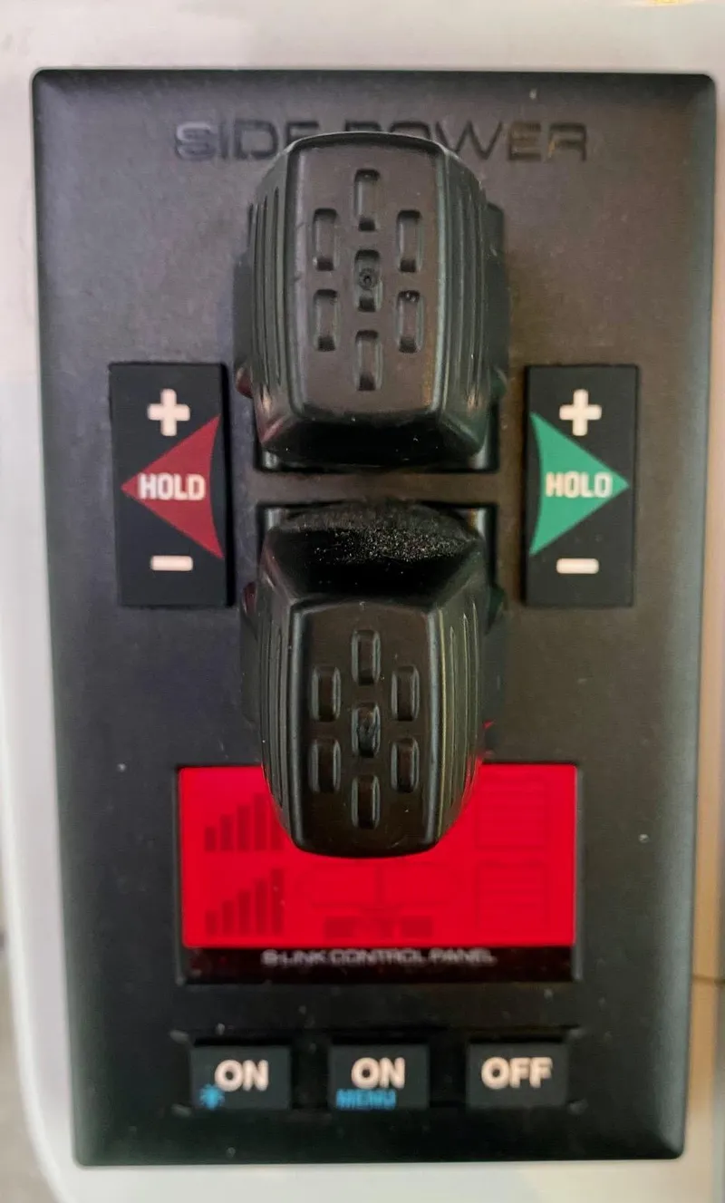 Slide: The Image of Control panel of a 2017 Back Cove 37 boat. - 34