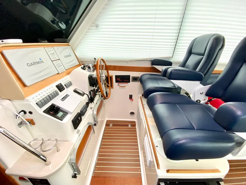 Slide: The Image of Interior of a 2017 Back Cove 37 with Garmin navigation. - 37