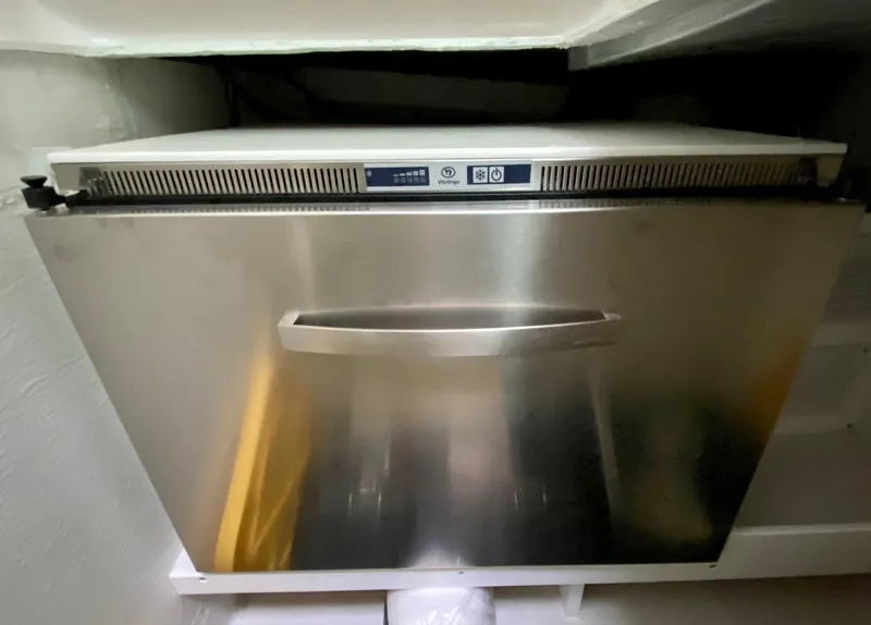 Slide: The Image of Stainless steel refrigerator in a 2017 Back Cove 37 yacht. - 39