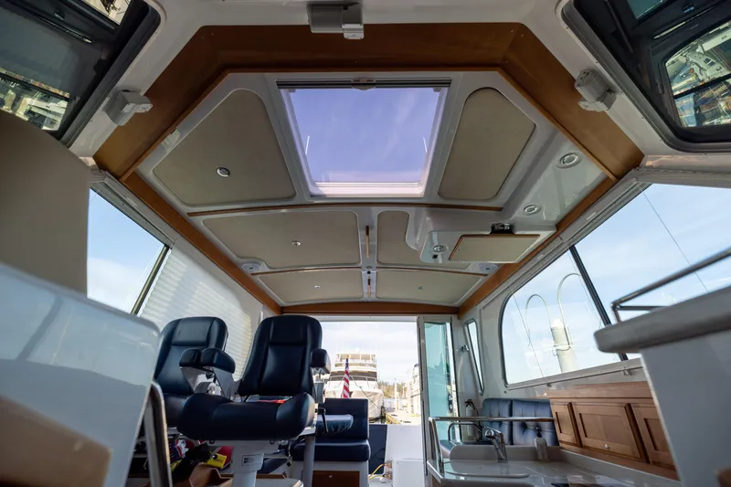Slide: The Image of Interior of a 2017 Back Cove 37 yacht with panoramic windows. - 41