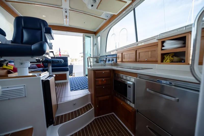 Slide: The Image of Interior of a 2017 Back Cove 37 yacht with modern kitchen. - 42