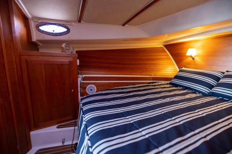Slide: The Image of Interior of 2017 Back Cove 37 yacht featuring cozy bedroom. - 48