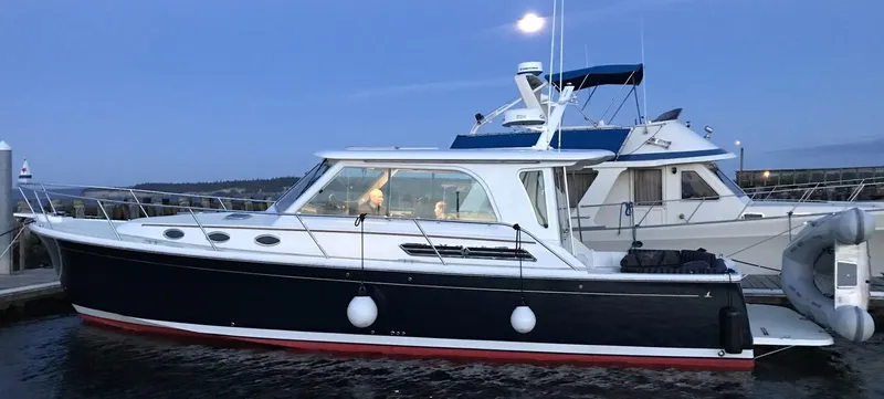 Slide: The Image of 2017 Back Cove 37 yacht docked at twilight. - 5