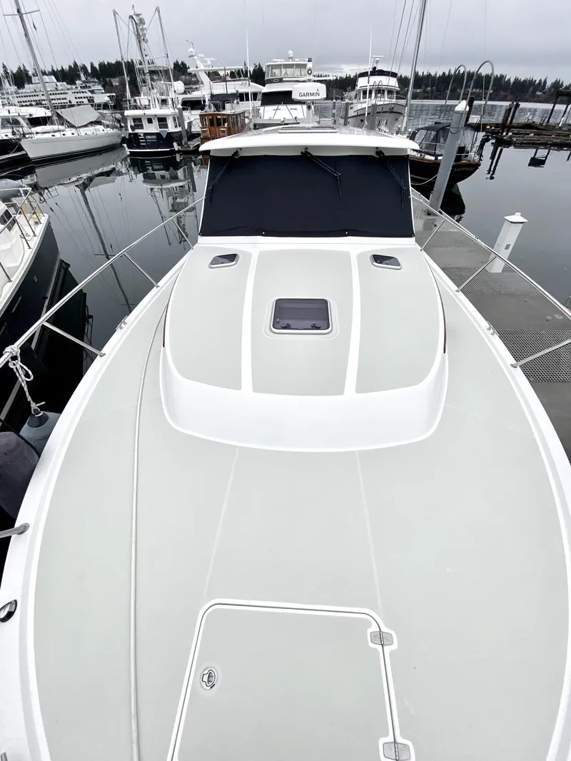 Slide: The Image of 2017 Back Cove 37 yacht docked at marina. - 9
