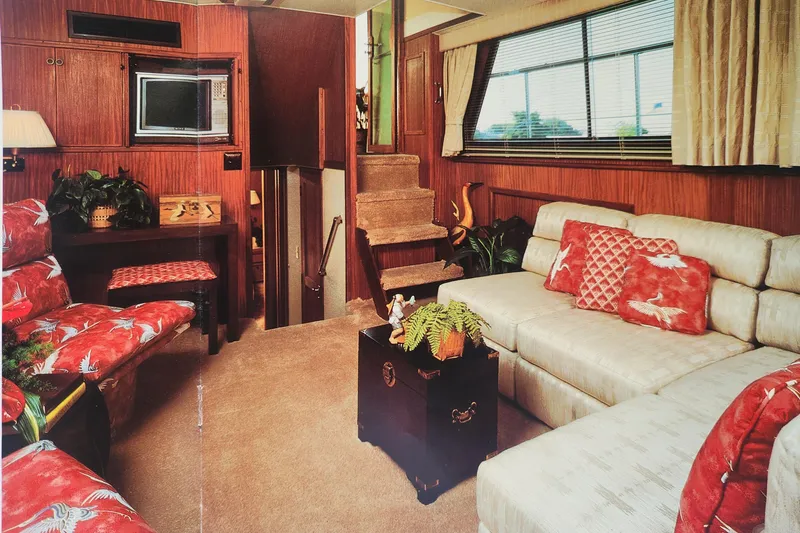 Slide: The Image of Interior of 1983 Hatteras 48 Motor Yacht with cozy seating and vintage decor. - 45