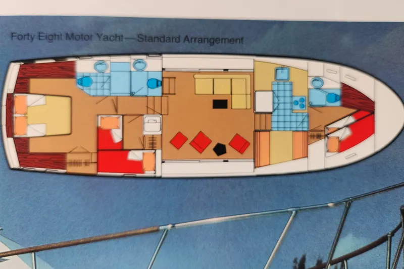 Slide: The Image of Floor plan of a 1983 Hatteras 48 Motor Yacht, standard arrangement layout. - 49