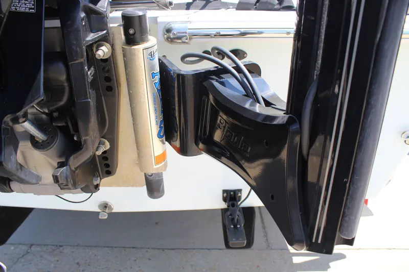 Slide: The Image of Close-up of a 2023 Intruder 23 boat outboard motor. - 13