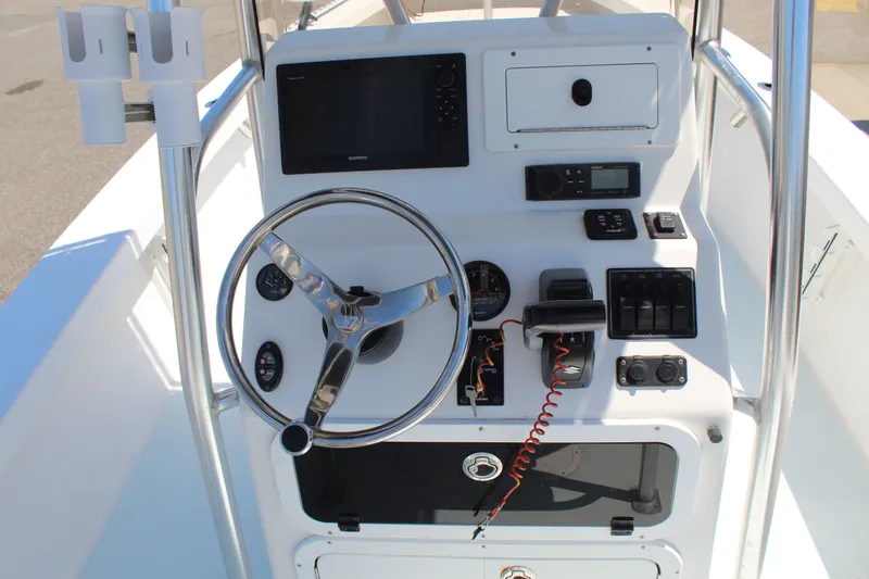 Slide: The Image of 2023 Intruder 23 boat model steering console. - 18