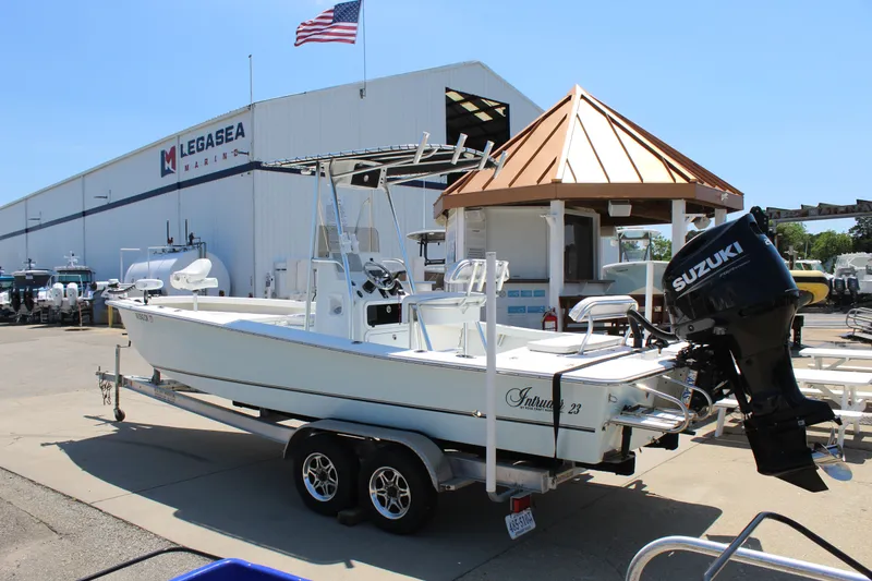 Slide: The Image of 2023 Intruder 23 boat in front of Legasea Marine building. - 2