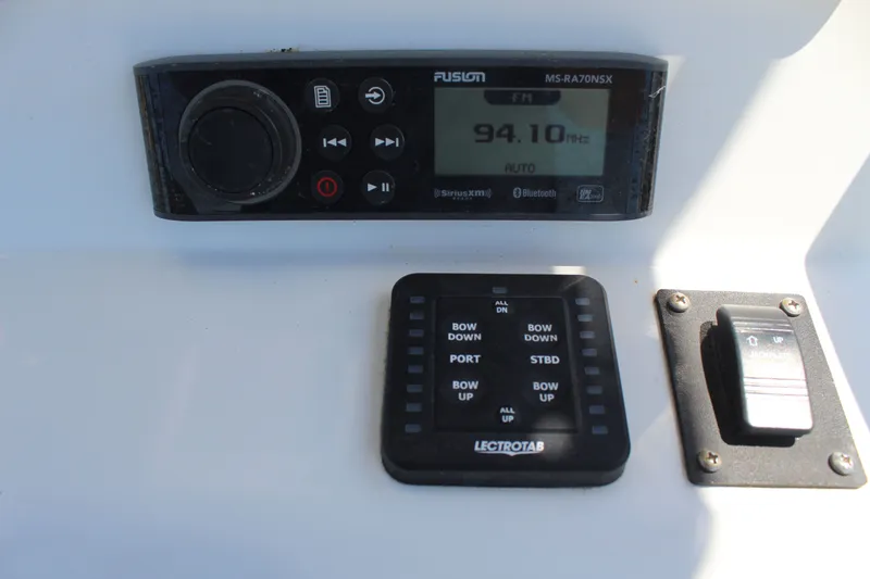 Slide: The Image of 2023 Intruder 23 control panel with radio and controls. - 20