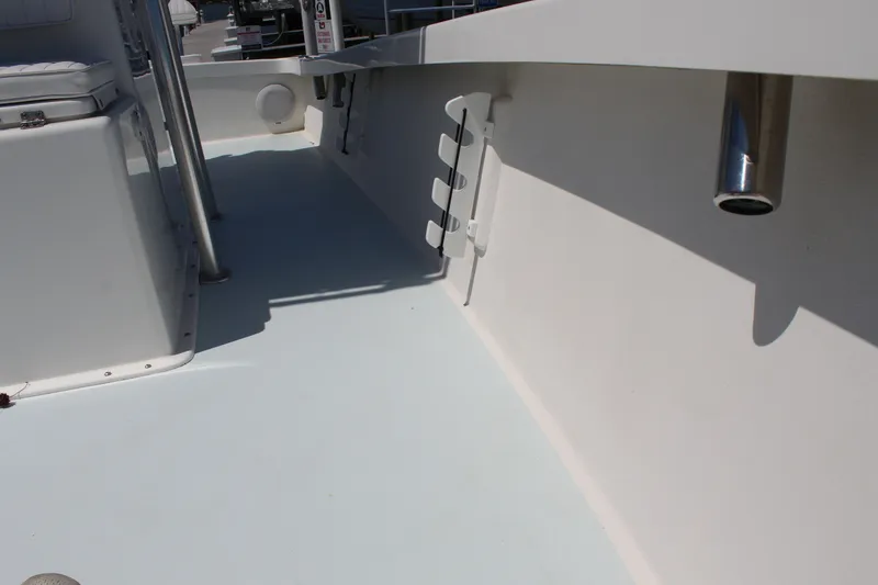 Slide: The Image of Interior of a 2023 Intruder 23 boat with seating area. - 27