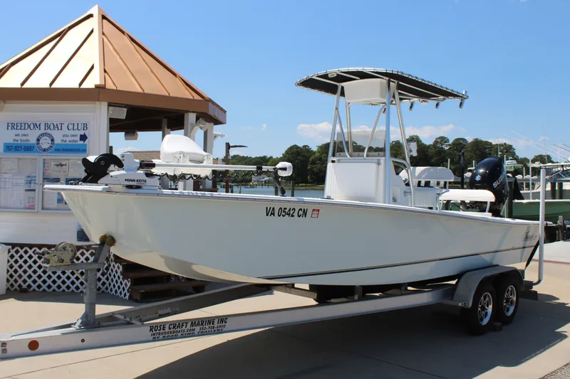 Slide: The Image of 2023 Intruder 23 boat on trailer at Freedom Boat Club. - 4
