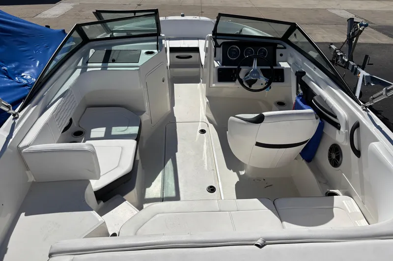Slide: The Image of 2022 Sea Ray SPX 190 Outboard boat interior with seating and steering console. - 4