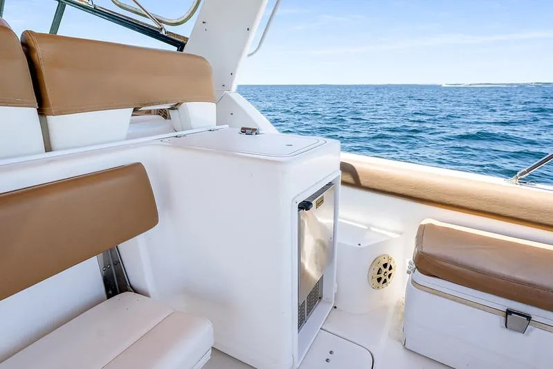 Slide: The Image of Interior of 2000 Tiara 3500 EXPRESS yacht with ocean view and seating area. - 22