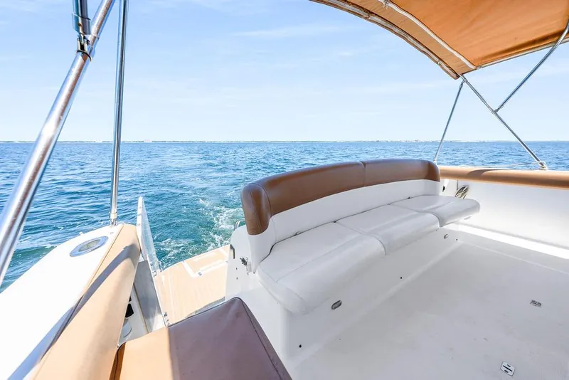Slide: The Image of Tiara 3500 EXPRESS 2000 boat interior with ocean view and seating area. - 24