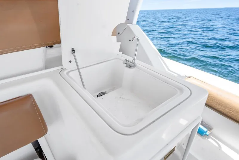 Slide: The Image of Tiara 3500 EXPRESS 2000 boat sink with ocean view in background. - 26