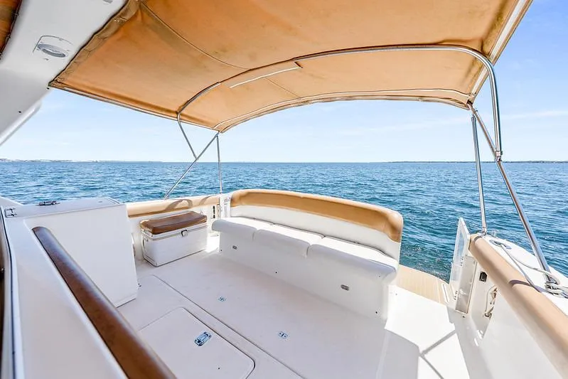 Slide: The Image of Spacious deck of 2000 Tiara 3500 EXPRESS yacht with ocean view and canopy. - 31