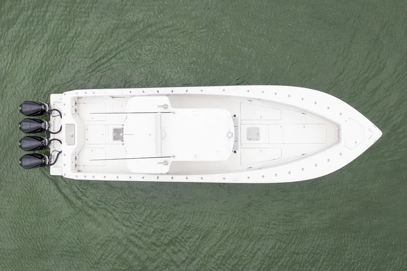 Slide: The Image of Overhead view of 2018 SeaVee 390Z boat with triple outboard engines. - 15