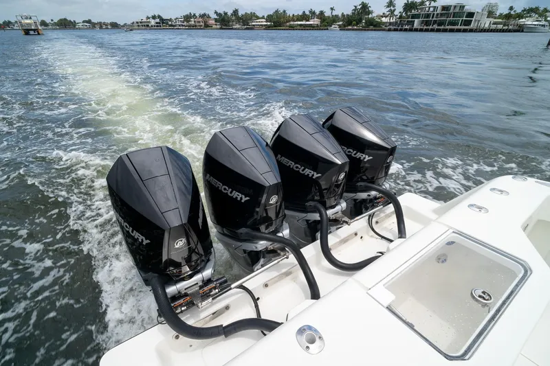 Slide: The Image of 2018 SeaVee 390Z boat with four Mercury outboard engines on the water. - 20