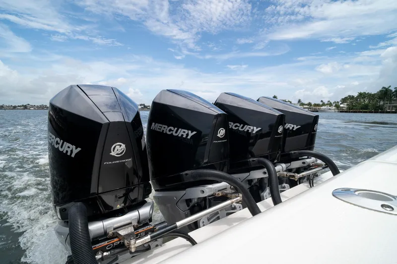 Slide: The Image of 2018 SeaVee 390Z boat with four Mercury outboard engines on the water. - 23