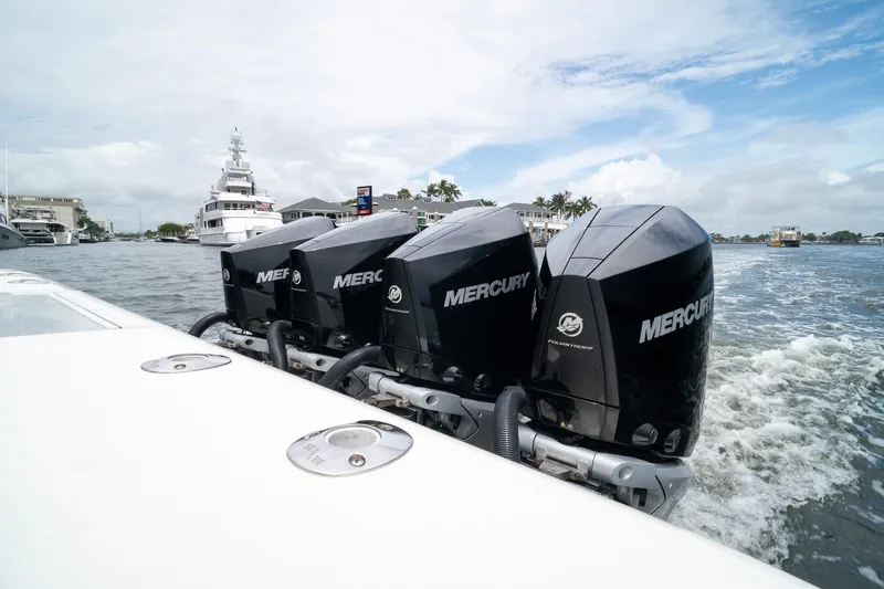 Slide: The Image of 2018 SeaVee 390Z with four Mercury outboard engines cruising on a waterway. - 24