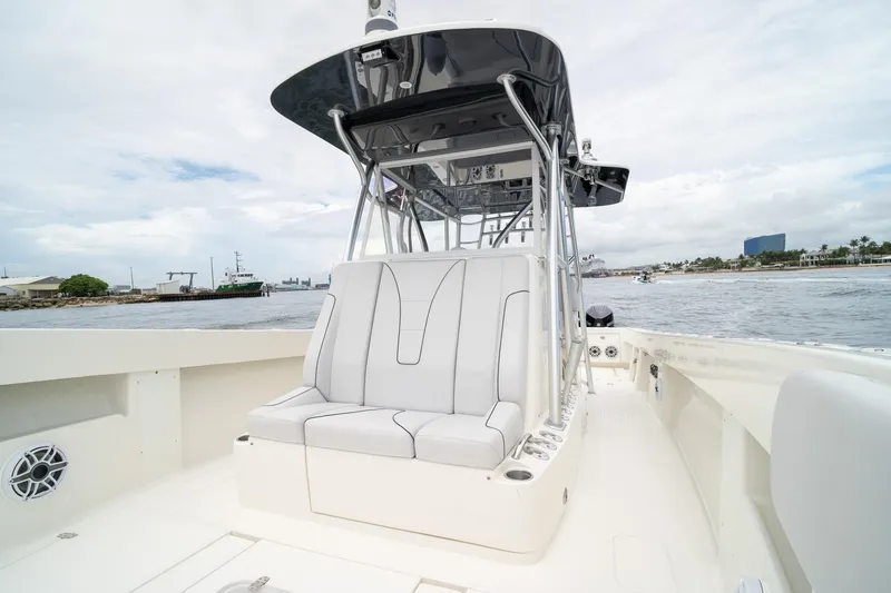 Slide: The Image of 2018 SeaVee 390Z boat with sleek seating and ocean backdrop. - 37