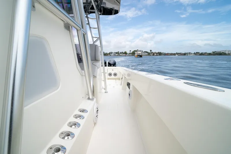 Slide: The Image of 2018 SeaVee 390Z boat deck with ocean view and clear sky. - 61