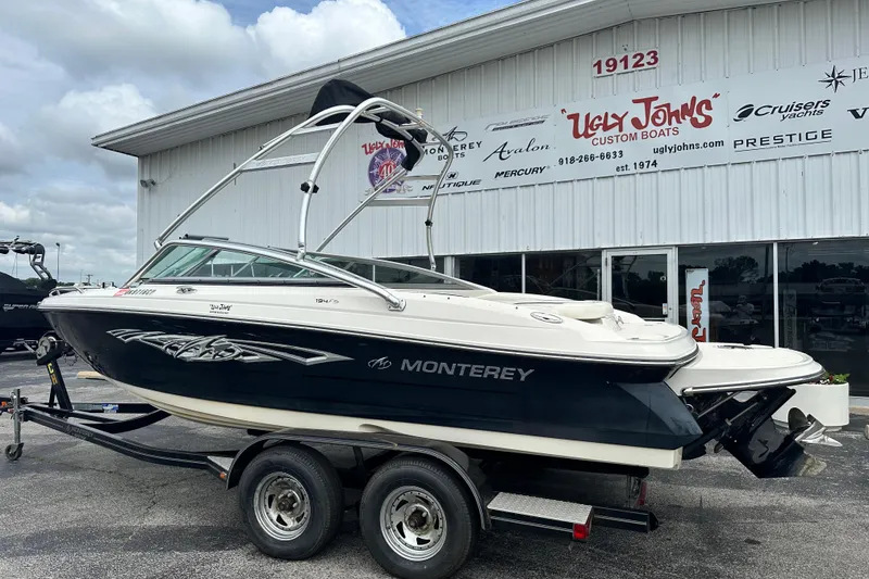 Slide: The Image of 2008 Monterey 194FS boat on trailer at Ugly John's Custom Boats dealership. - 3