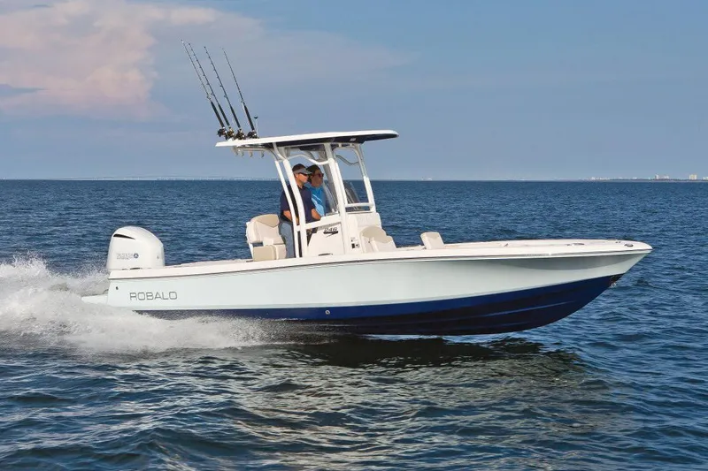 Slide: The Image of Manufacturer Provided Image: 2017 Robalo 246 Cayman boat cruising on open water. - 12