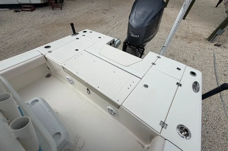 Slide: The Image of 2017 Robalo 246 Cayman boat deck with Yamaha 300 outboard motor. - 2