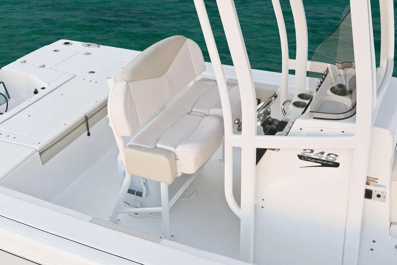Slide: The Image of Manufacturer Provided Image: 2017 Robalo 246 Cayman boat interior with seating and console. - 20