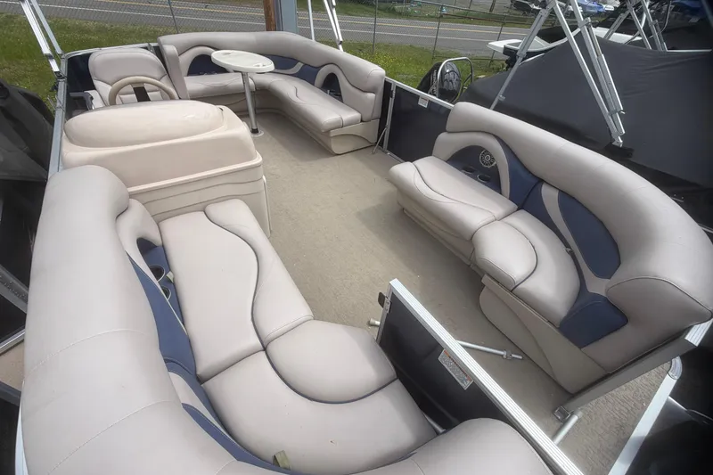 Slide: The Image of 2014 Sylvan Mirage Cruise 818 CR pontoon boat with spacious seating and table. - 11