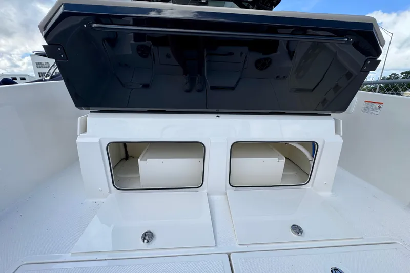Slide: The Image of Open storage compartments on a 2026 Navan S30 boat, showcasing spacious interior design. - 21