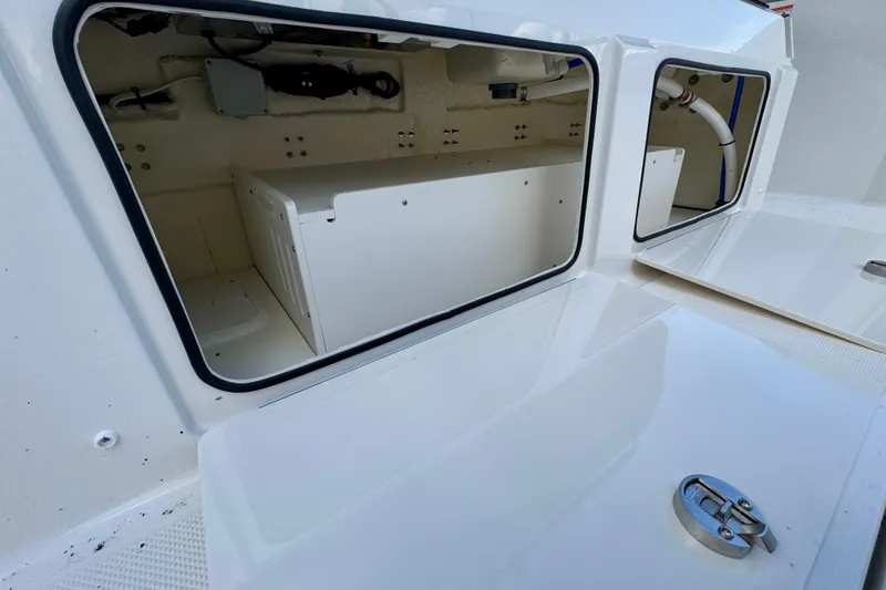 Slide: The Image of Storage compartments in a 2026 Navan S30 boat, showcasing interior space and design. - 22
